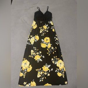 Brand No Boundaries. Size Medium. Spring Black dress with yellow flowers.